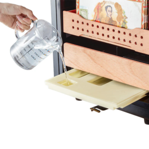 Filling the Hemingway Humidor B1 water reservoir with distilled water for automatic humidification